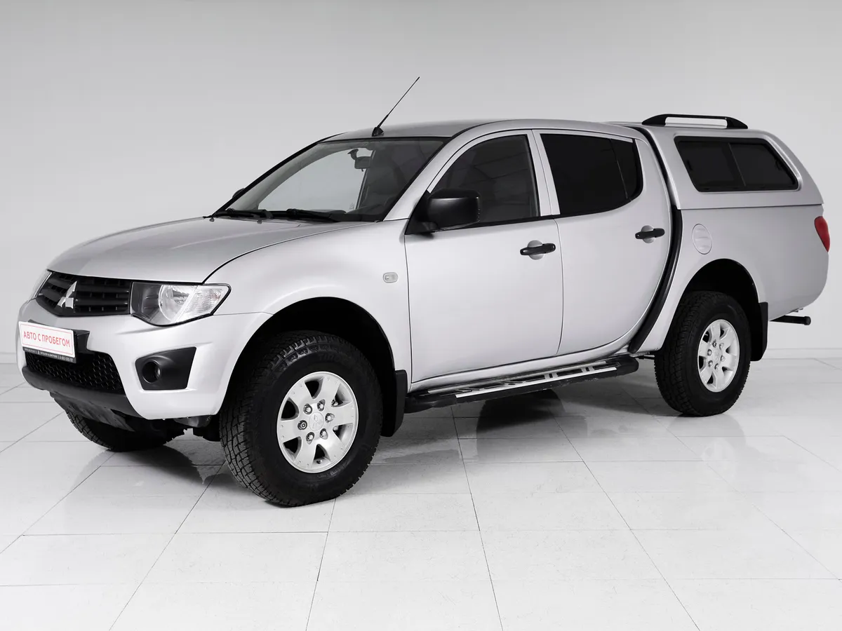 Mitsubishi L200 IV · DC Invite+