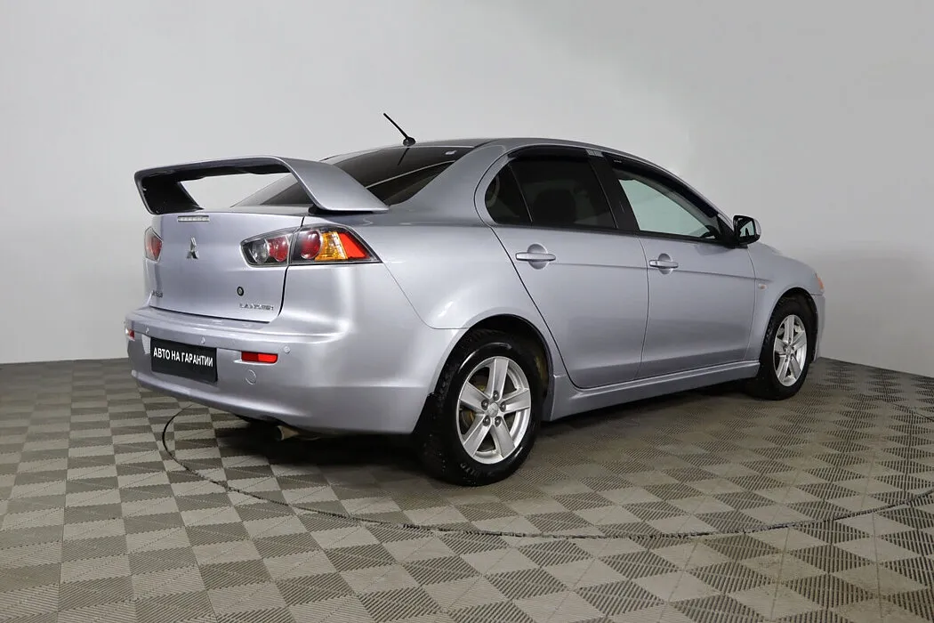 Mitsubishi Lancer X Рестайлинг · Invite — фото 4