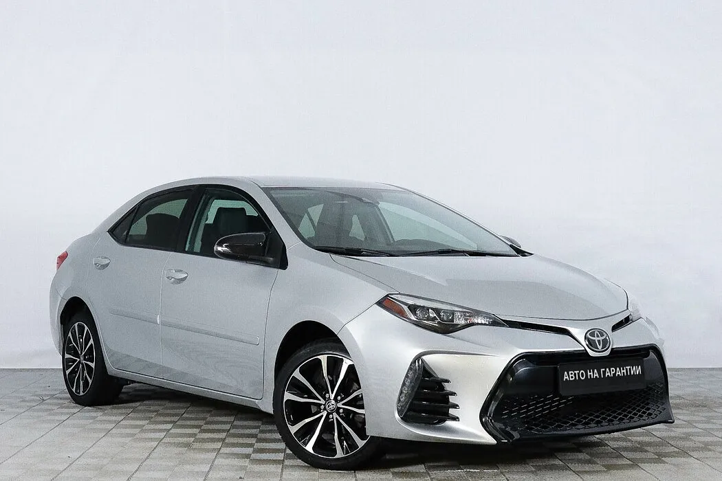 Toyota Corolla XI (E160, E170, E180) Рестайлинг 1 · Стиль Плюс