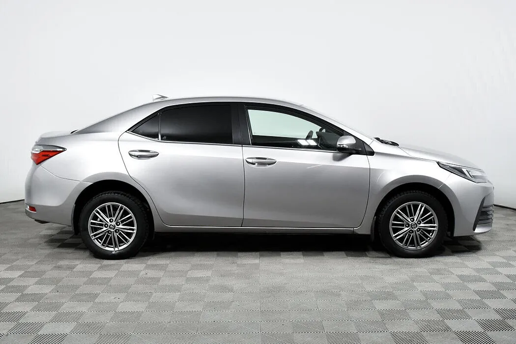 Toyota Corolla XI (E160, E170, E180) Рестайлинг 1 · Стиль Плюс — фото 3