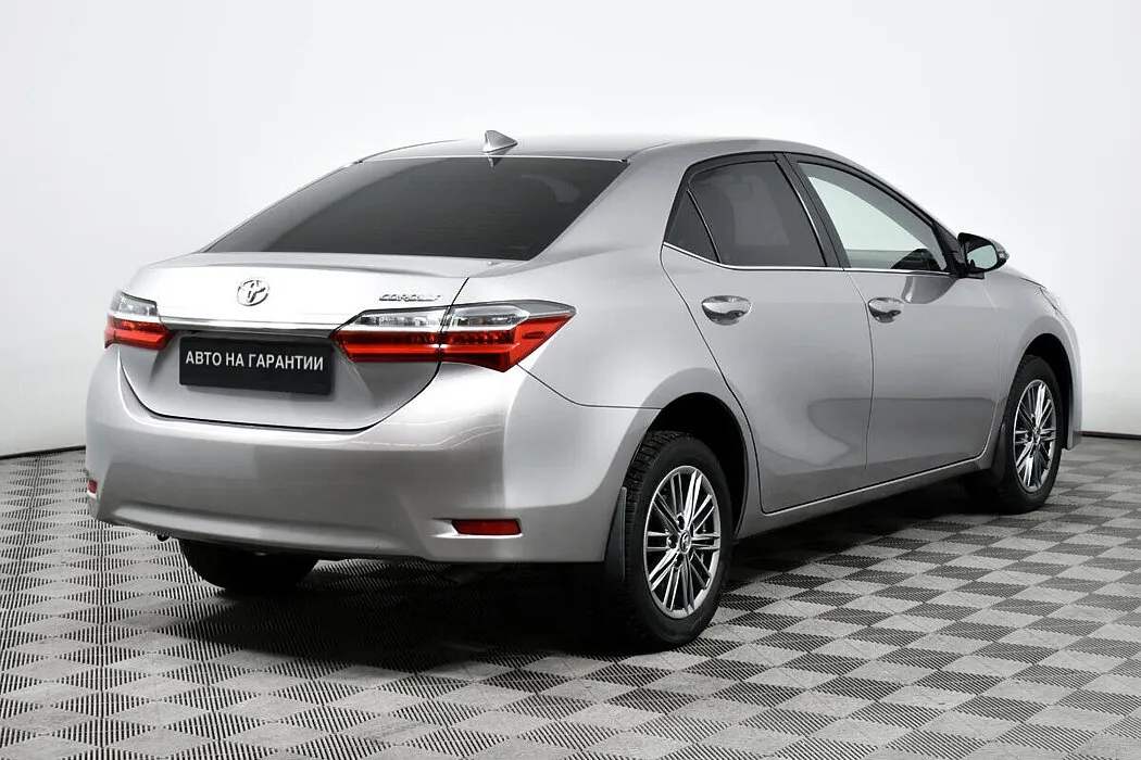 Toyota Corolla XI (E160, E170, E180) Рестайлинг 1 · Стиль Плюс — фото 4