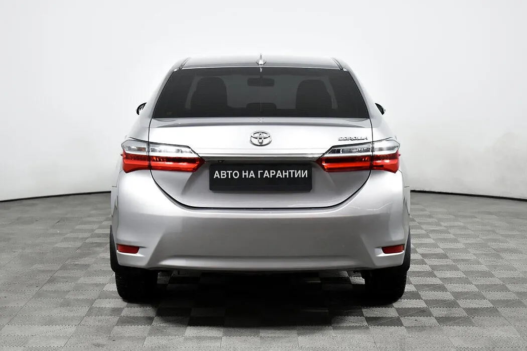 Toyota Corolla XI (E160, E170, E180) Рестайлинг 1 · Стиль Плюс — фото 5