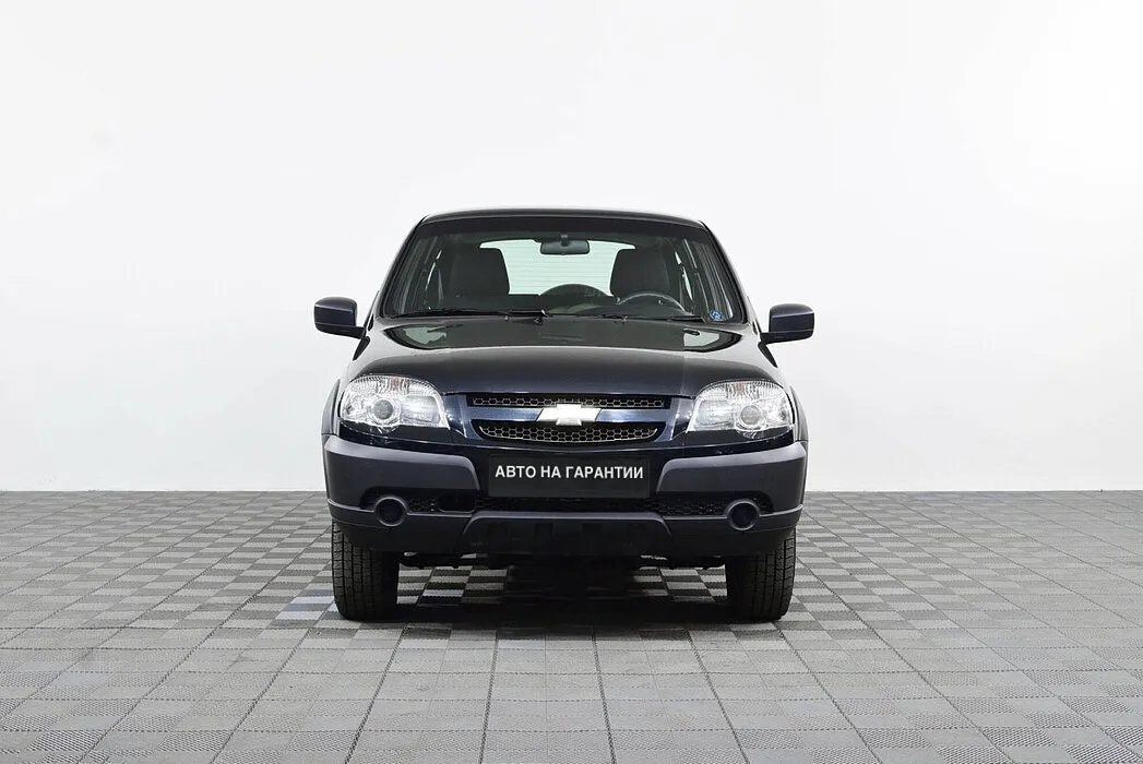 Chevrolet Niva I Рестайлинг · L — фото 2