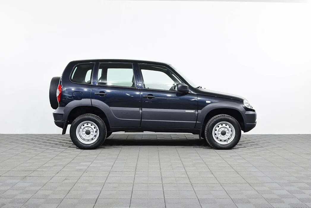 Chevrolet Niva I Рестайлинг · L — фото 3
