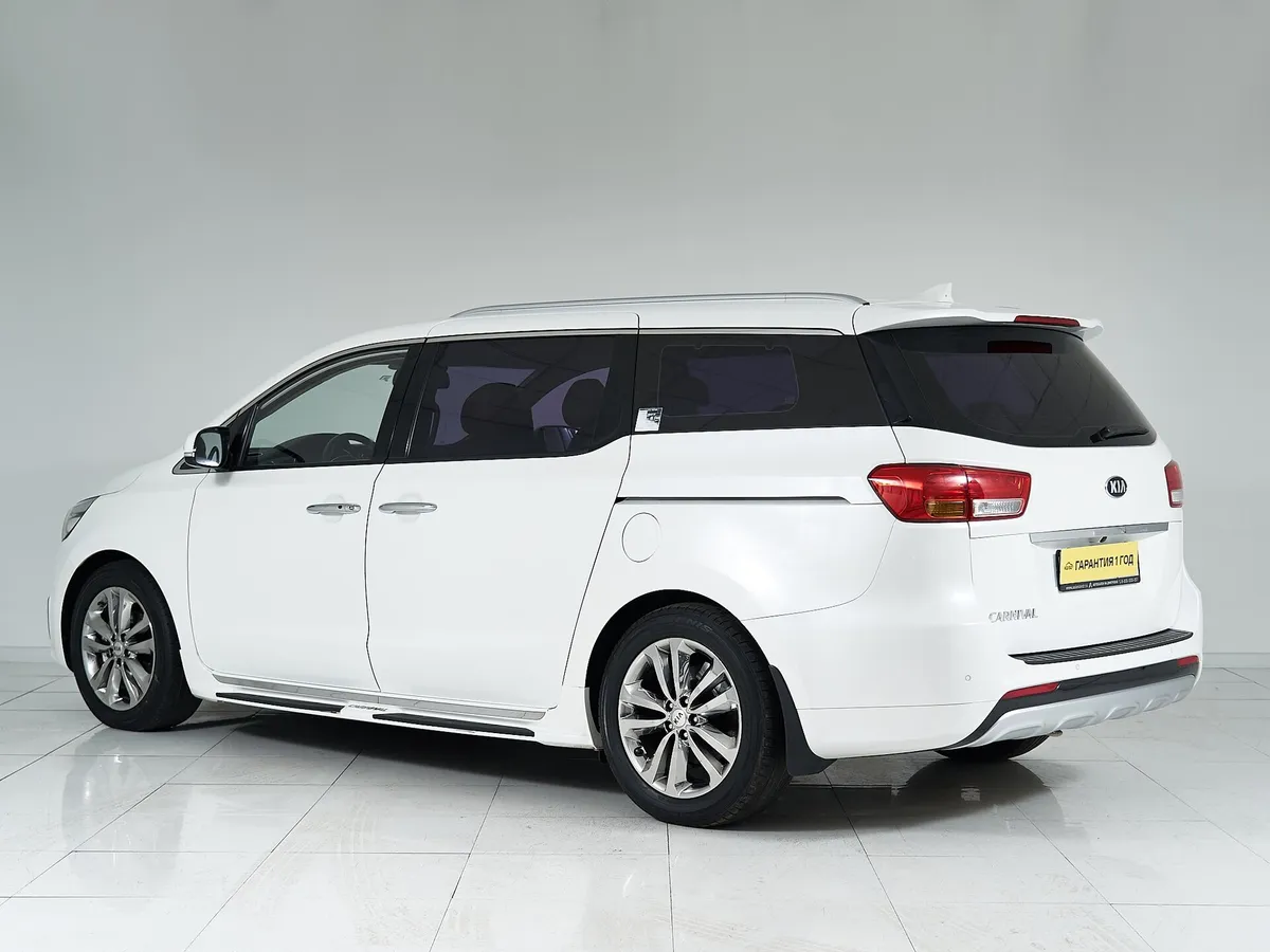 Kia Carnival III — фото 4