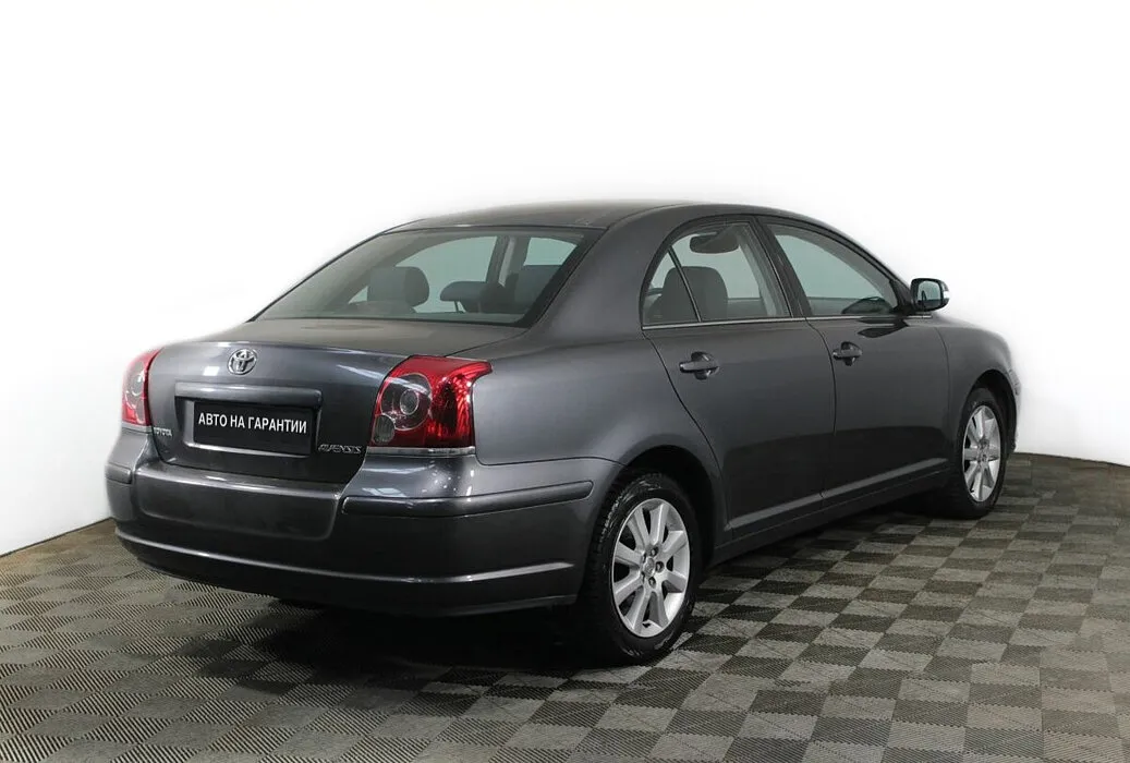 Toyota Avensis II Рестайлинг · Сол — фото 4