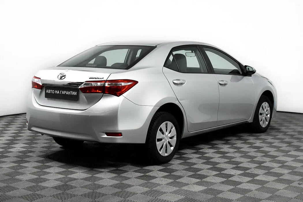 Toyota Corolla XI (E160, E170, E180) Рестайлинг 1 — фото 4
