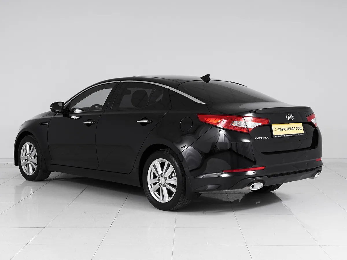 Kia Optima III · Prestige — фото 4