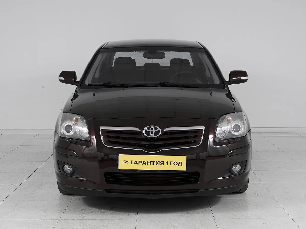 Toyota Avensis II Рестайлинг · Сол — фото 2