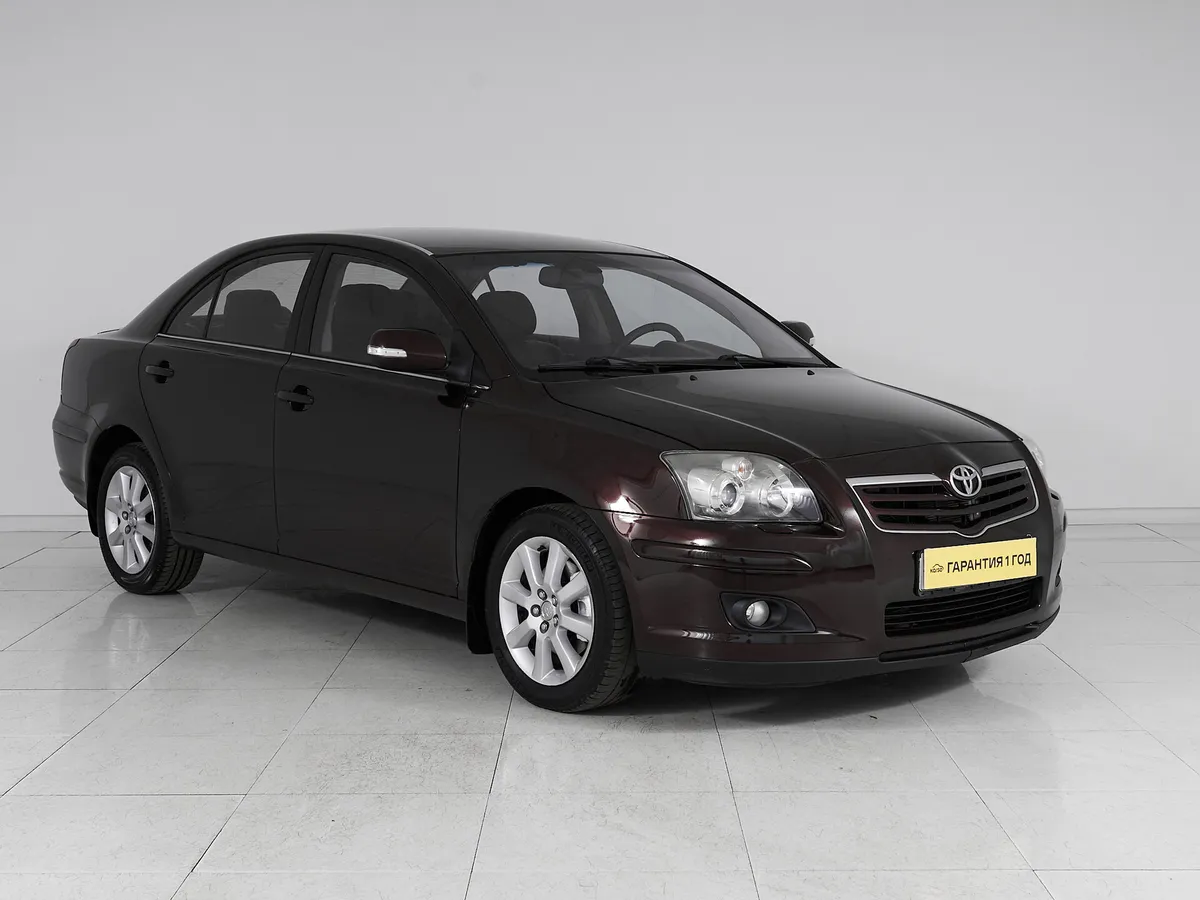 Toyota Avensis II Рестайлинг · Сол — фото 3