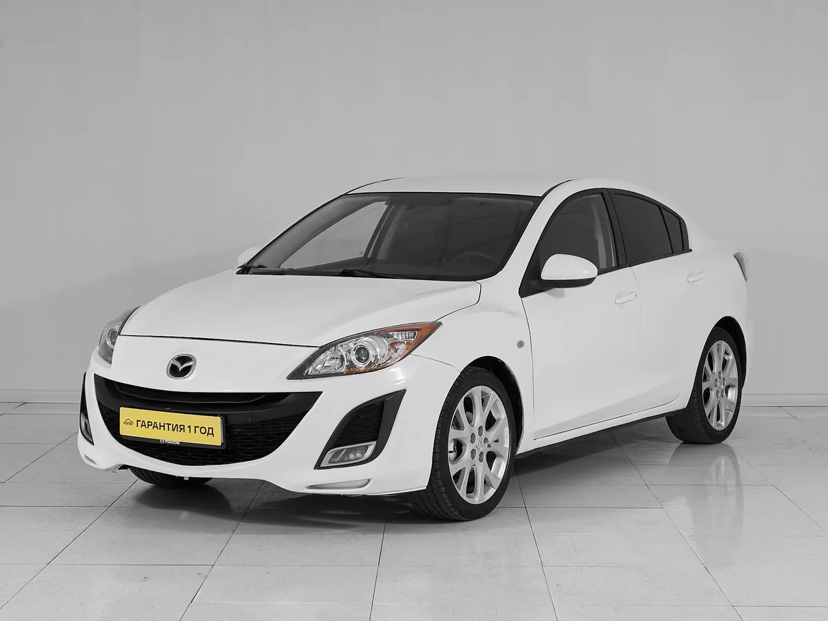 Mazda 3 II (BL) Рестайлинг · Touring Plus