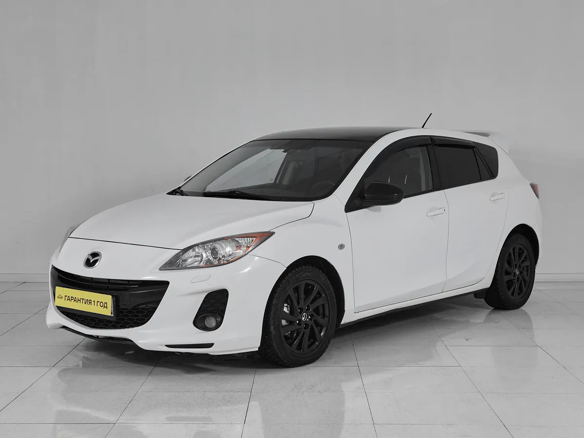 Mazda 3 II (BL) Рестайлинг · Touring Plus