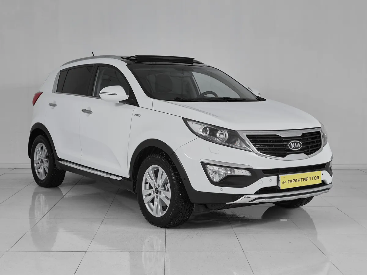 Kia Sportage III · Premium — фото 3