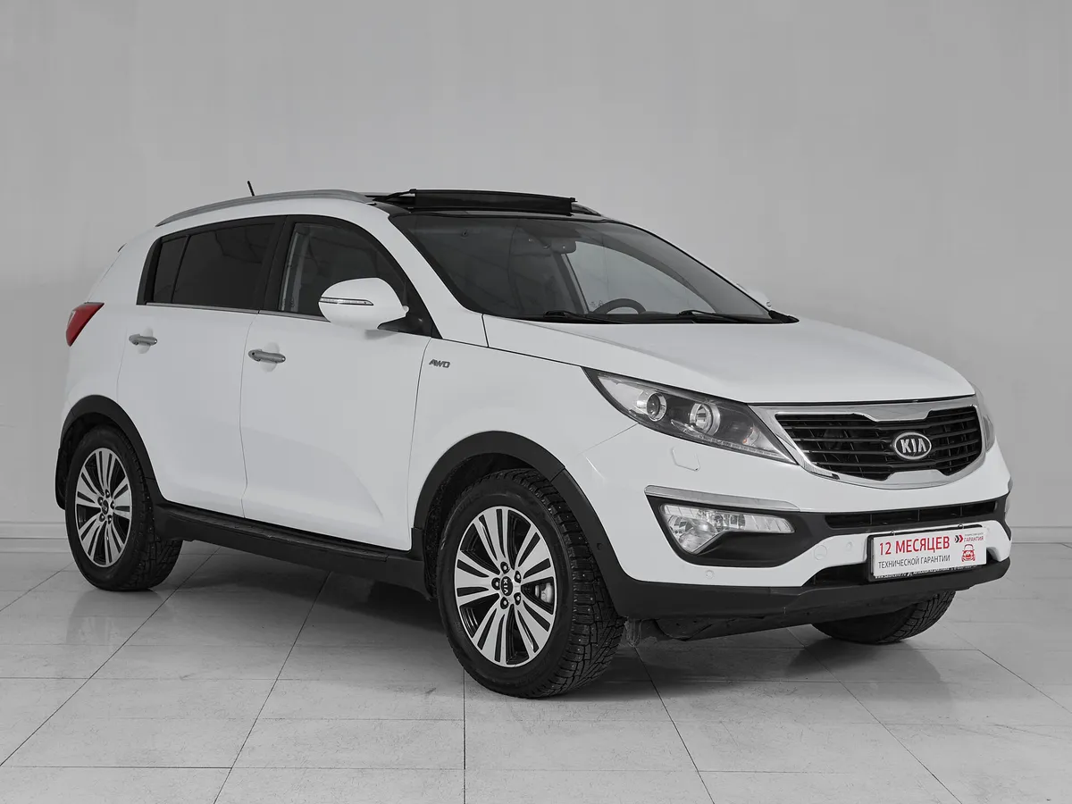 Kia Sportage III · Premium — фото 3