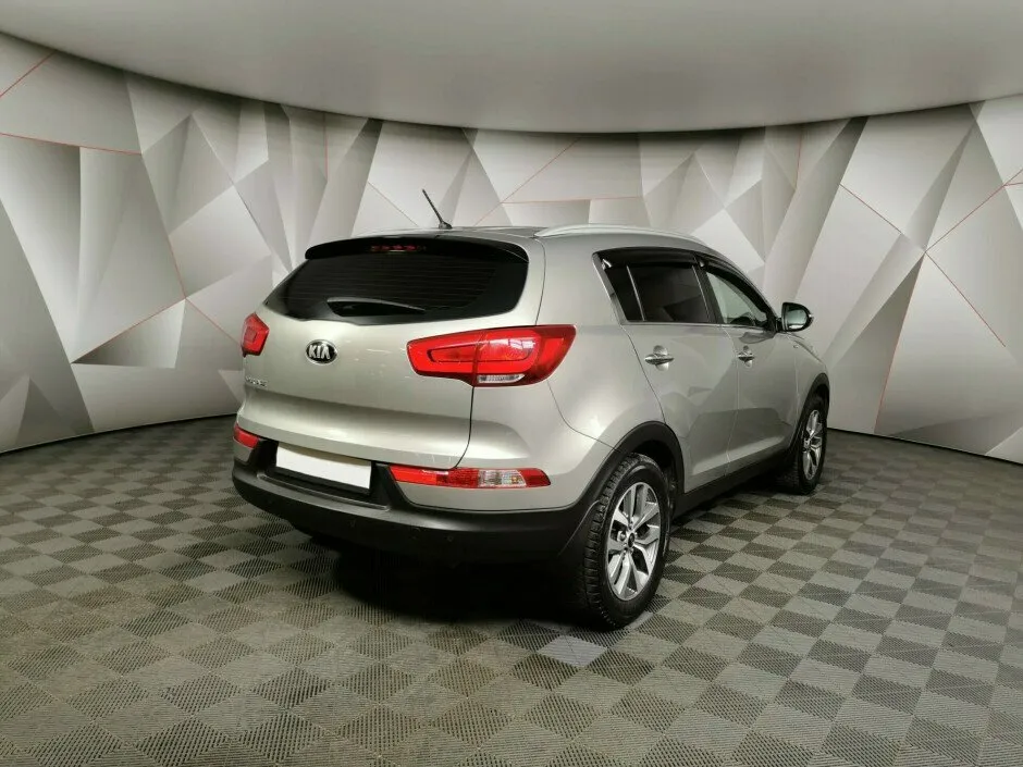 Kia Sportage III Рестайлинг — фото 2