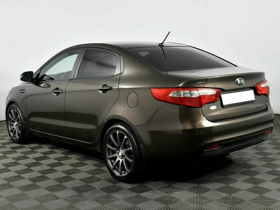 Kia Rio III — фото 3