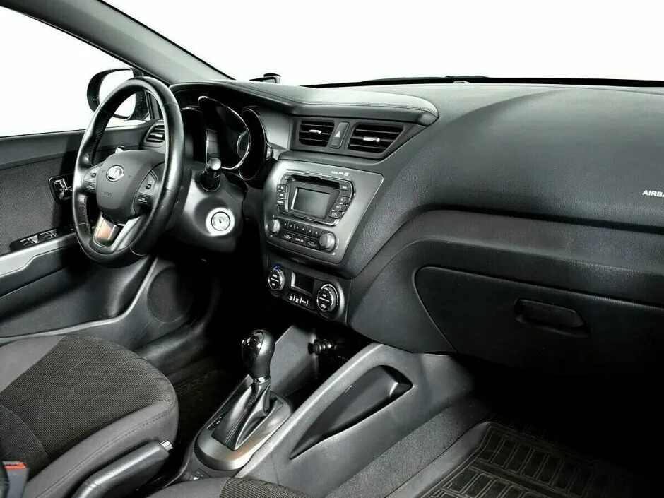 Kia Rio III — фото 5