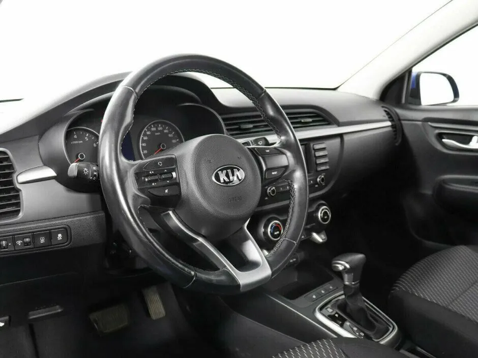 Kia Rio IV — фото 5