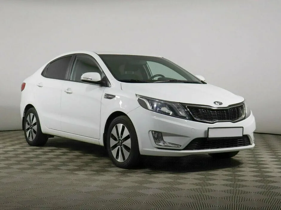Kia Rio III — фото 3