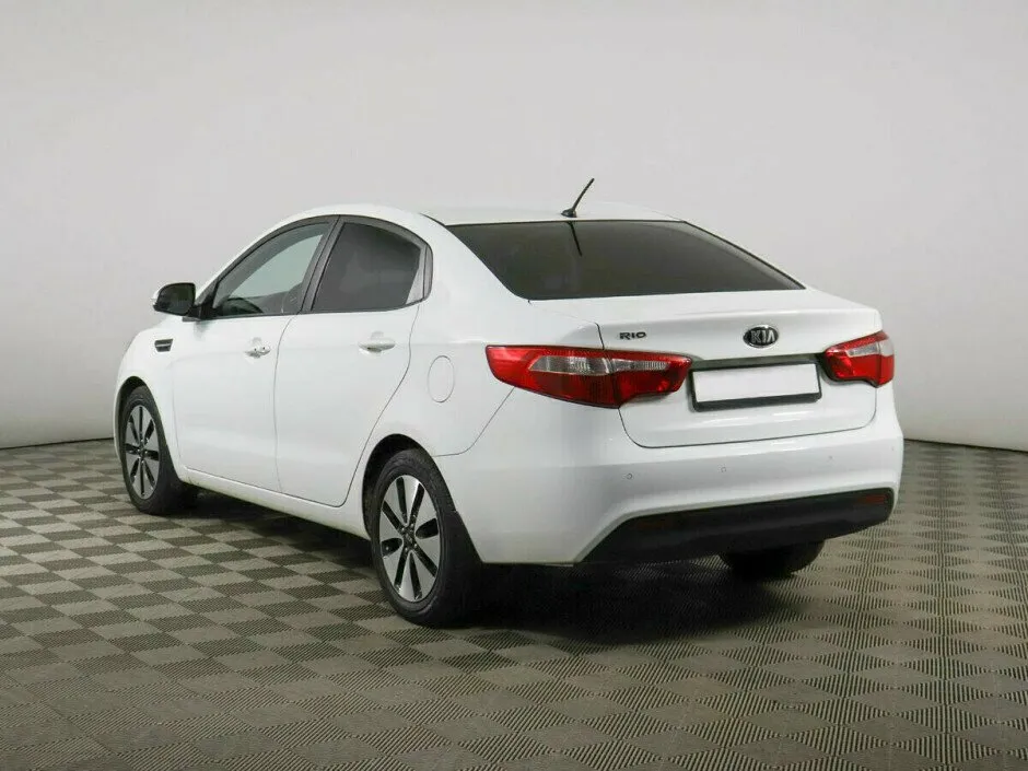 Kia Rio III — фото 4