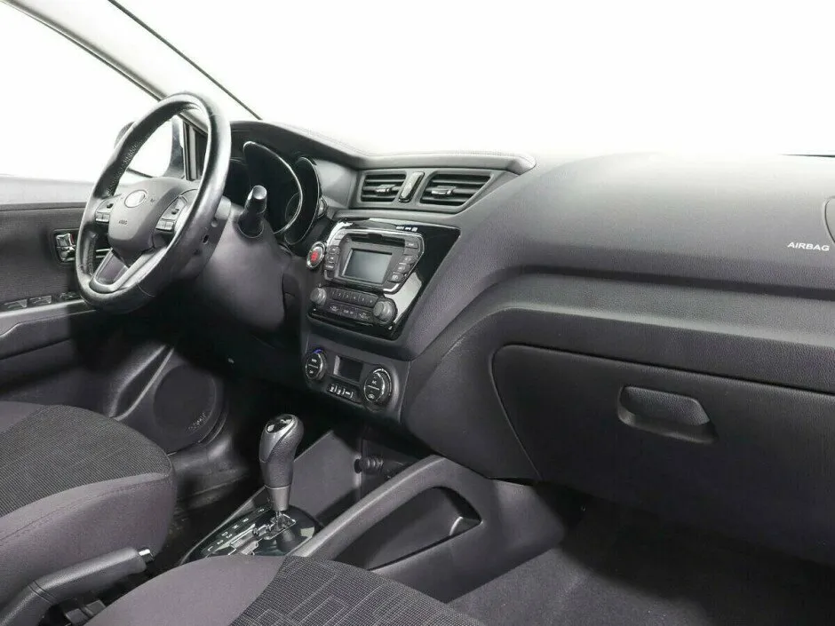 Kia Rio III — фото 5