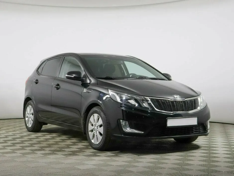 Kia Rio III — фото 3