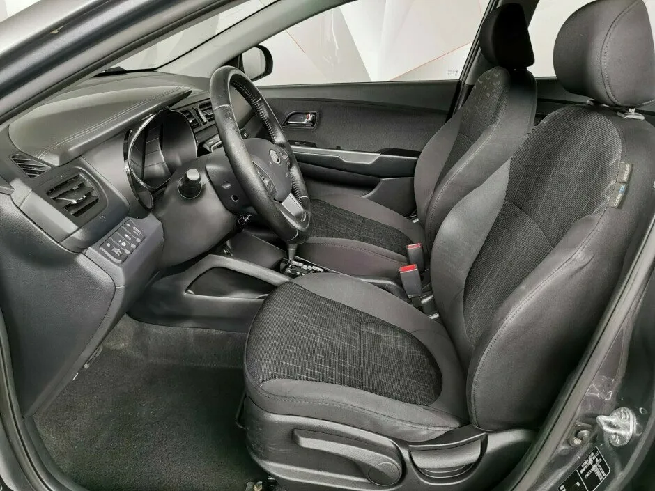 Kia Rio III — фото 5