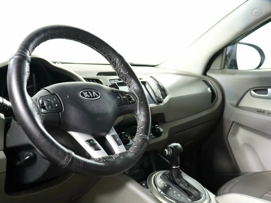 Kia Sportage III — фото 5