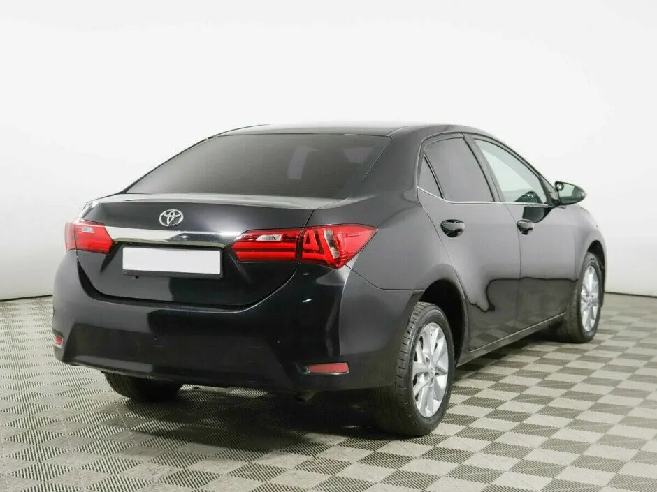 Toyota Corolla XI (E160, E170, E180) — фото 2