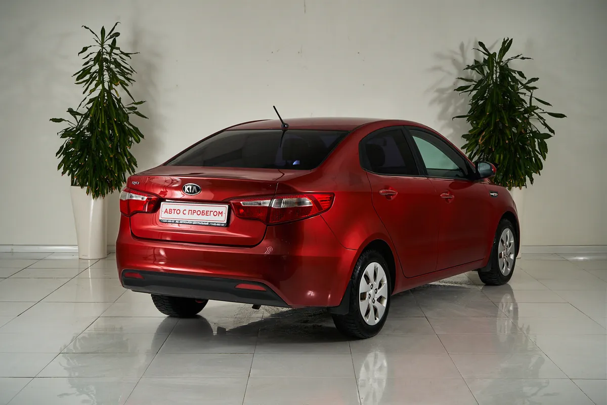 Kia Rio III — фото 5