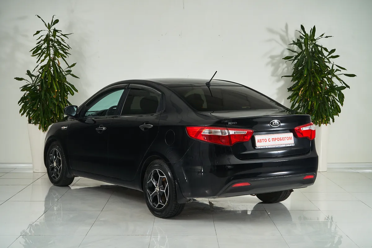 Kia Rio III — фото 4
