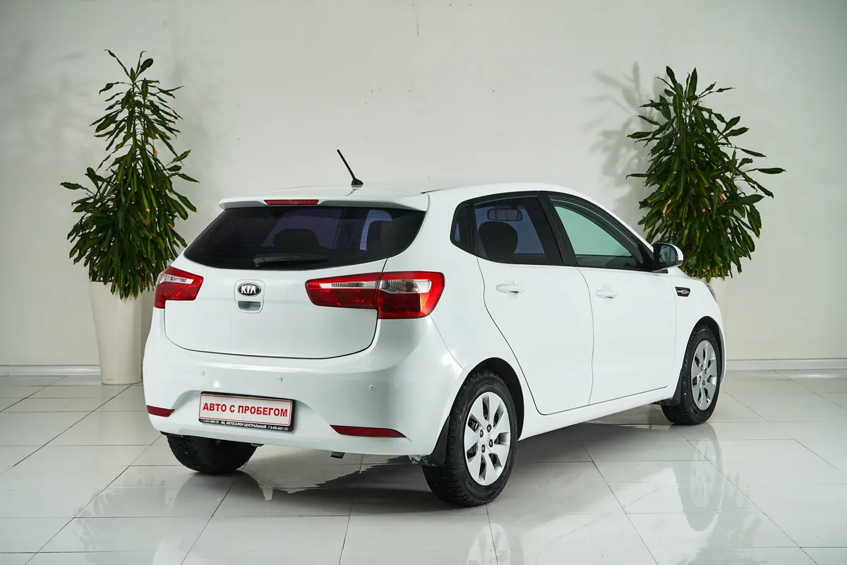 Kia Rio III — фото 5