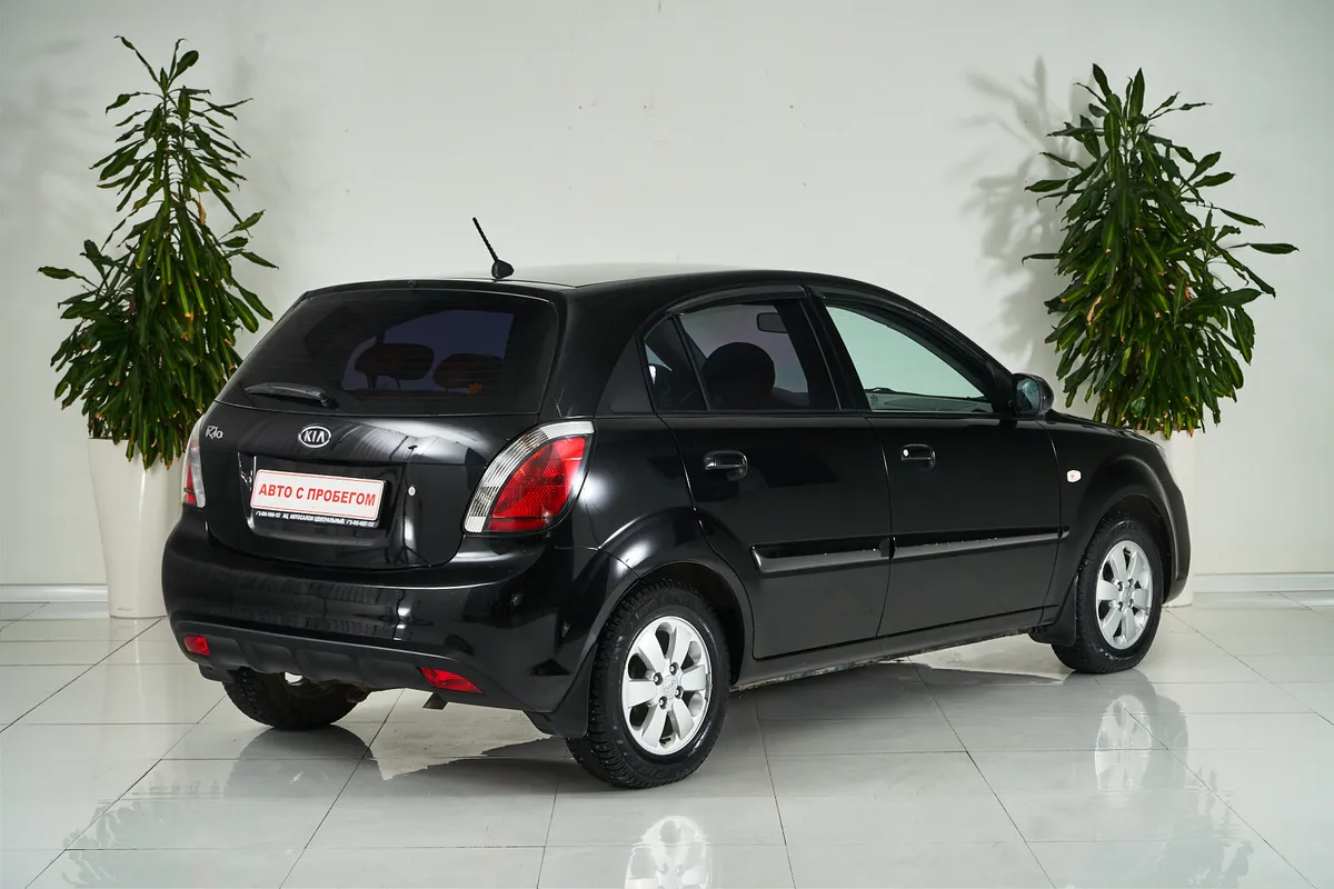 Kia Rio III — фото 5