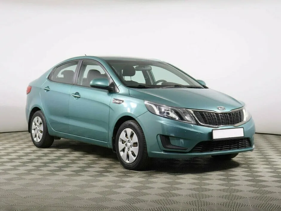 Kia Rio III — фото 3
