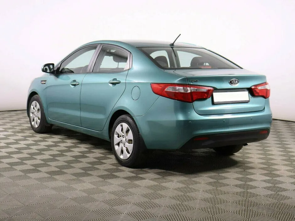 Kia Rio III — фото 4