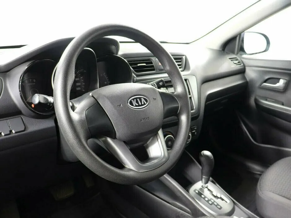 Kia Rio III — фото 5