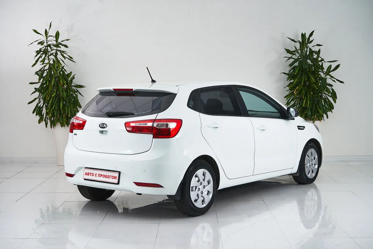 Kia Rio III — фото 5