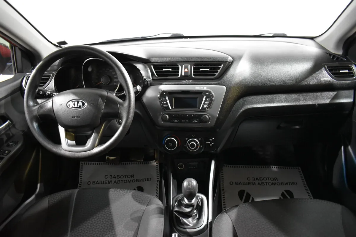 Kia Rio III — фото 5