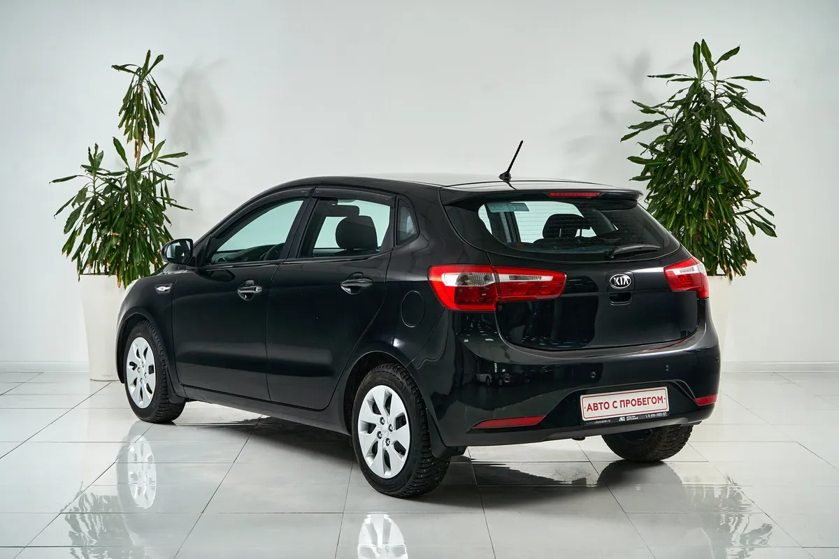 Kia Rio III — фото 5