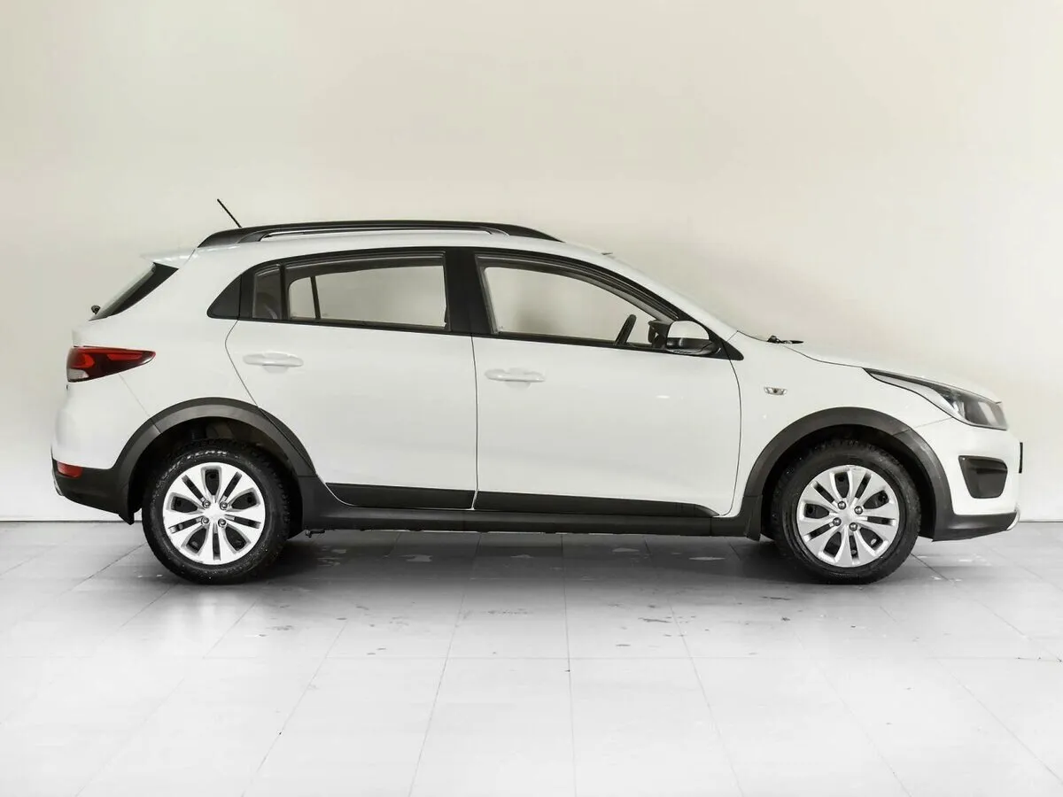 Kia Rio IV — фото 5