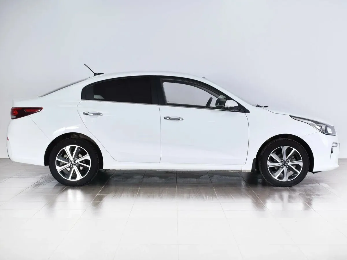 Kia Rio IV — фото 5