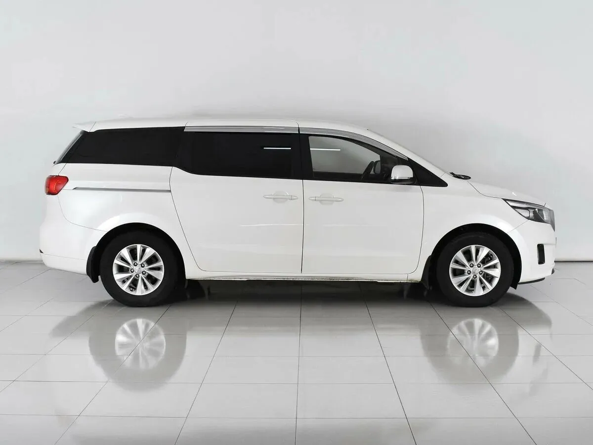 Kia Carnival III — фото 5