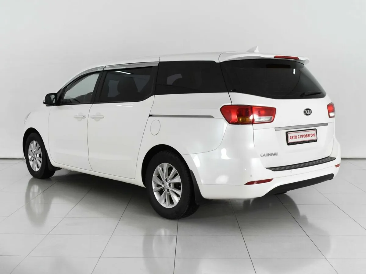 Kia Carnival III — фото 4