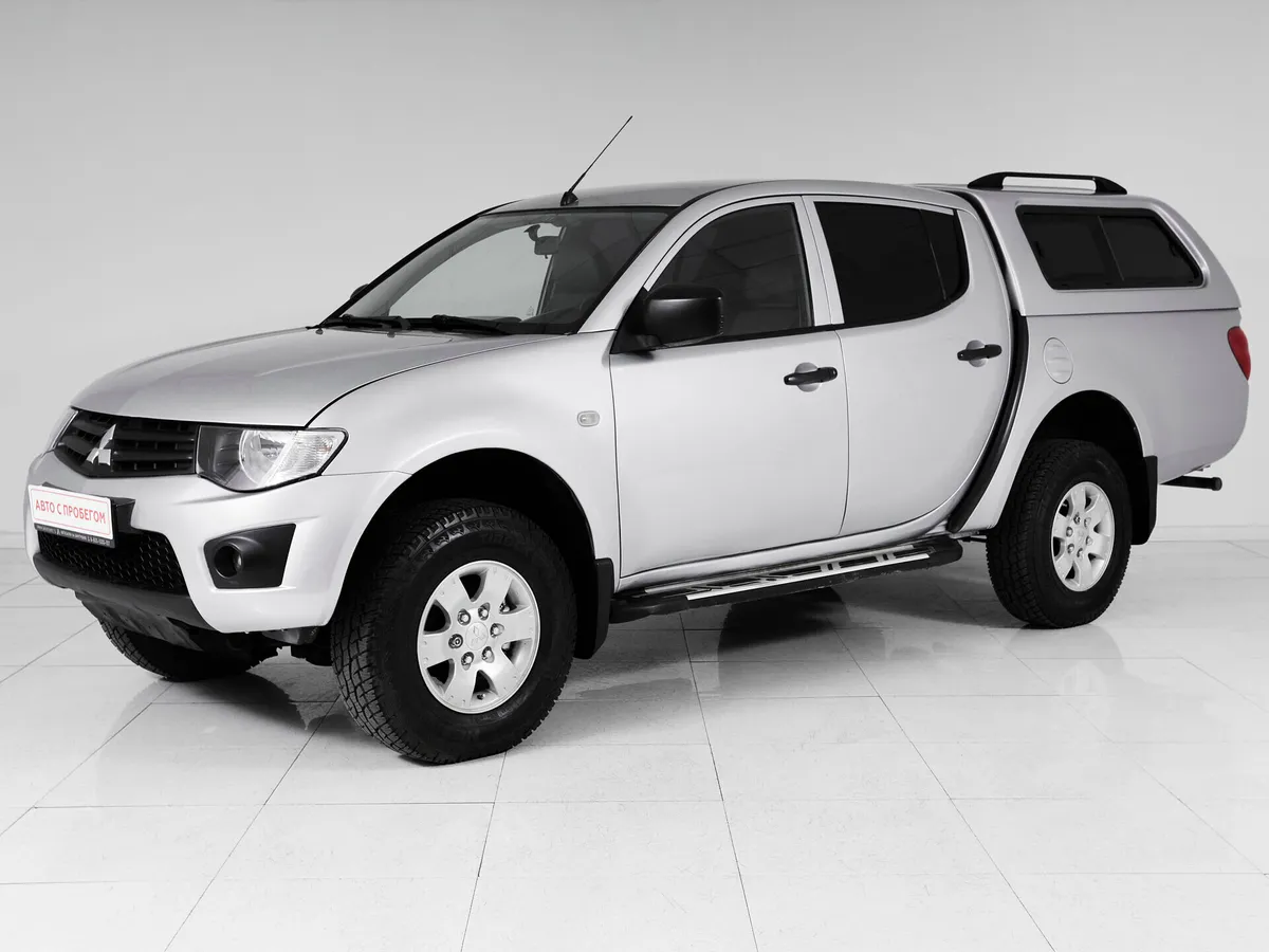 Mitsubishi L200 IV · DC Invite+