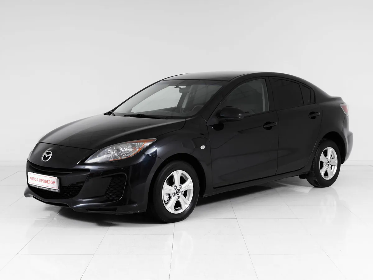 Mazda 3 II (BL) Рестайлинг · Touring Plus