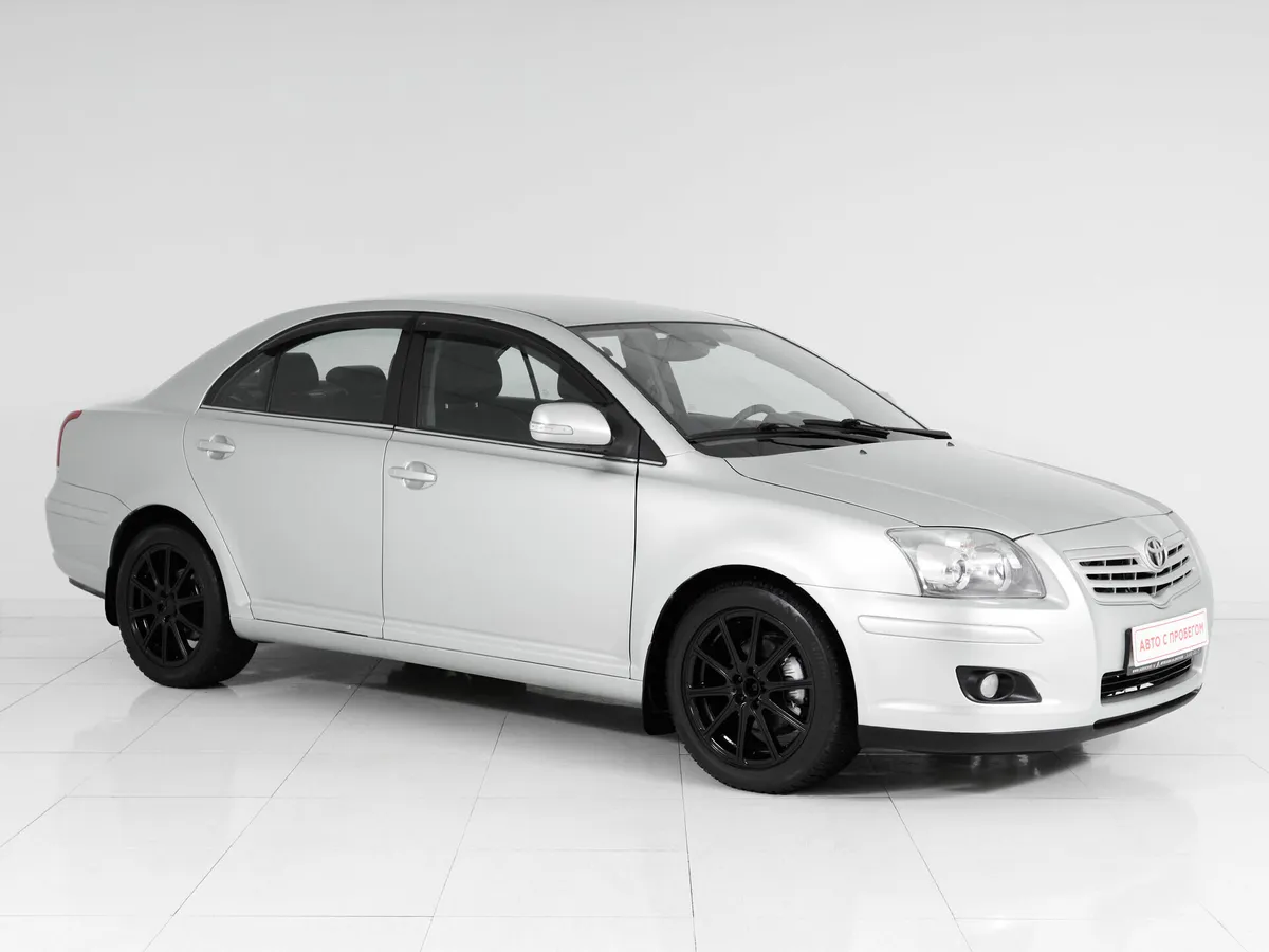 Toyota Avensis II Рестайлинг · Сол — фото 3