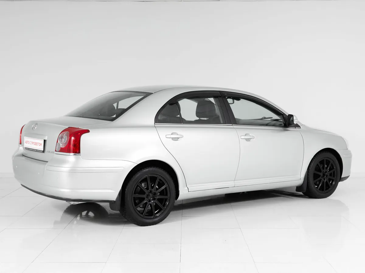 Toyota Avensis II Рестайлинг · Сол — фото 5