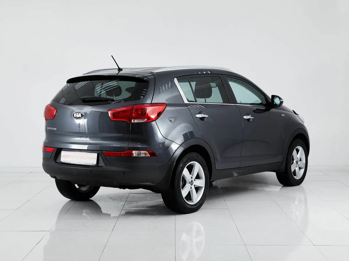 Kia Sportage III Рестайлинг — фото 5
