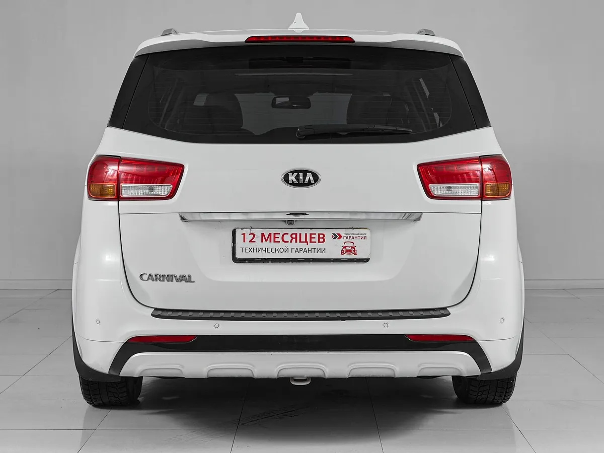 Kia Carnival III — фото 5