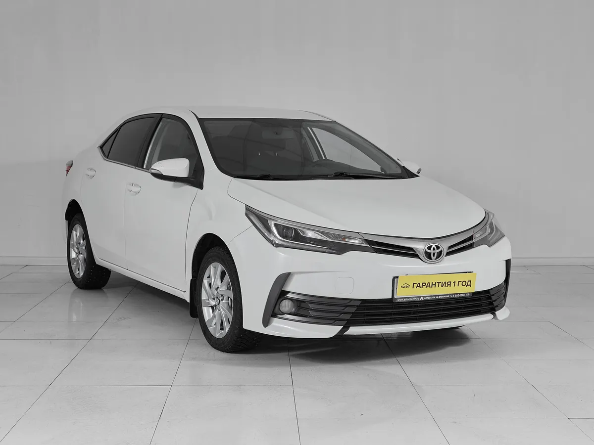 Toyota Corolla XI (E160, E170, E180) Рестайлинг 1 · Стиль — фото 3